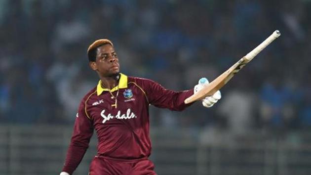 West Indies cricketer Shimron Hetmyer raises his bat after scoring a half century (50 runs) during the second one day international (ODI) cricket match between India and West Indies at the Dr. Y.S. Rajasekhara Reddy ACA-VDCA Cricket Stadium in Visakhapatnam on October 24, 2018. (AFP) West Indies cricketer Shimron Hetmyer raises his bat after scoring a half century (50 runs) during the second one day international (ODI) cricket match between India and West Indies at the Dr. Y.S. Rajasekhara Reddy ACA-VDCA Cricket Stadium in Visakhapatnam on October 24, 2018. (AFP)