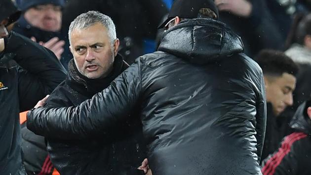 Manchester United's Portuguese manager Jose Mourinho (L) and Liverpool's German manager Jurgen Klopp shake hands. (AFP) Manchester United's Portuguese manager Jose Mourinho (L) and Liverpool's German manager Jurgen Klopp shake hands. (AFP)