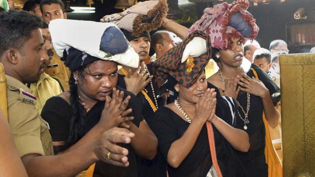 Four transgenders draped in sarees, who were earlier denied permission to visit the Sabarimala temple on Sunday, completed their darshan of the Lord Ayyappa shrine on Tuesday after securing permission a day ago. The four devotees from Ernakulam draped in their choice of attire -- saree -- were given security cover as they started their climb from Pamba at 8 am. (PTI) Four transgenders draped in sarees, who were earlier denied permission to visit the Sabarimala temple on Sunday, completed their darshan of the Lord Ayyappa shrine on Tuesday after securing permission a day ago. The four devotees from Ernakulam draped in their choice of attire -- saree -- were given security cover as they started their climb from Pamba at 8 am. (PTI)