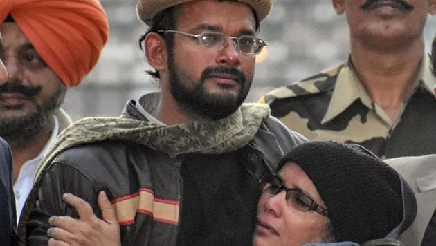 Hamid Nehal Ansari being embraced by her mother Fauzia after crossing into India through the Attari border. (PTI) Hamid Nehal Ansari being embraced by her mother Fauzia after crossing into India through the Attari border. (PTI)