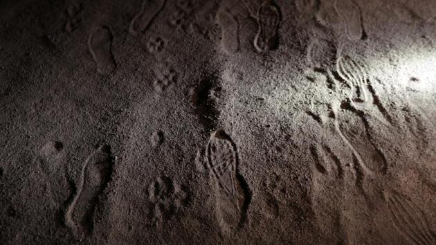 Migrants’ footprints are inspected during a police patrol at a restricted mined area of desert. Some migrants, like Torres, travel up to 9,000 km by air and land to get as far as Chile. The country has the highest GDP per capita in South America, low levels of corruption and the lowest murder rate, according to figures from the World Bank and InSight Crime, a foundation analysing organized crime. (Ivan Alvarado / REUTERS)