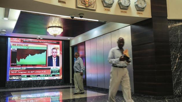 Views of the RBI And BSE as central bank chief’s exit roils Indian markets already jittery from election. (Bloomberg) Views of the RBI And BSE as central bank chief’s exit roils Indian markets already jittery from election. (Bloomberg)