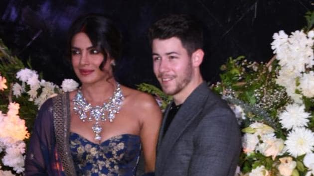 Priyanka Chopra, Nick Jonas pose at their Mumbai wedding reception.