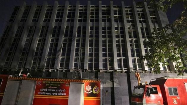 Fire engines are parked in front of a partially damaged hospital after it caught fire in the suburbs of Mumbai, India.(Reuters file photo)