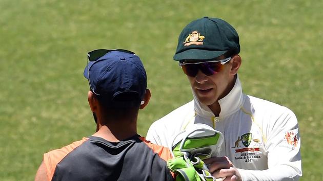 Australia's captain Tim Paine (R) shakes hand with Indian captain Virat Kohli after winning the second Test cricket match between Australia and India in Perth on December 18, 2018(AFP)