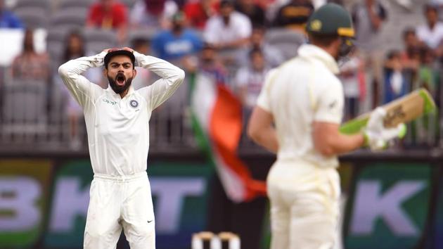 India's captain Virat Kohli (L) yells at Australia's captain Tim Paine (R) on the third day of the second cricket Test match in Perth on December 16, 2018(AFP)