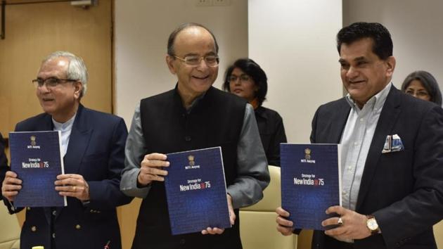 Finance minister Arun Jaitley and NITI Aayog vice-chairman Dr. Rajiv Kumar and NITI Aayog CEO Amitabh Kant release NITI Aayog’s strategy document for New India. Jaitley expressed confidence that the government will meet its fiscal deficit target for the year to March 31 without dipping into the central bank’s reserves, which he said could be used for recapitalising state-run banks or for public welfare. (Sanjeev Verma / HT Photo)