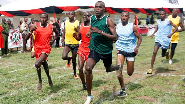 Maasai Morans compete during the 5000m race. Lekatoo was competing for his Mbirikani Manyatta group in the fourth edition of the Maasai Olympics, where youthful morans, or warriors, from four Manyattas (settlements) -- Rombo, Mbirikani, Kuku and Elselengei -- gathered to compete. (Thomas Mukoya / REUTERS) Maasai Morans compete during the 5000m race. Lekatoo was competing for his Mbirikani Manyatta group in the fourth edition of the Maasai Olympics, where youthful morans, or warriors, from four Manyattas (settlements) -- Rombo, Mbirikani, Kuku and Elselengei -- gathered to compete. (Thomas Mukoya / REUTERS)