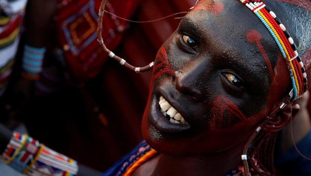 A Maasai Moran athlete from Mbirikani Manyatta rides in a truck as they arrive for the 2018 Maasai Olympics at the Sidai Oleng Wildlife Sanctuary, Kenya. Young Kenyan warriors are no longer pursuing lions to show off their hunting prowess and bravery, they are competing for cash prizes in sports events at the Maasai Olympics instead. (Thomas Mukoya / REUTERS) A Maasai Moran athlete from Mbirikani Manyatta rides in a truck as they arrive for the 2018 Maasai Olympics at the Sidai Oleng Wildlife Sanctuary, Kenya. Young Kenyan warriors are no longer pursuing lions to show off their hunting prowess and bravery, they are competing for cash prizes in sports events at the Maasai Olympics instead. (Thomas Mukoya / REUTERS)