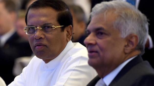 Sri Lankan President Maithripala Sirisena (L) and Sri Lankan Prime Minister Ranil Wickremasinghe sit together during the opening of the seminar "The Indian Ocean: Defining our Future" in Colombo on October 11, 2018. (Photo by ISHARA S. KODIKARA / AFP)(AFP)