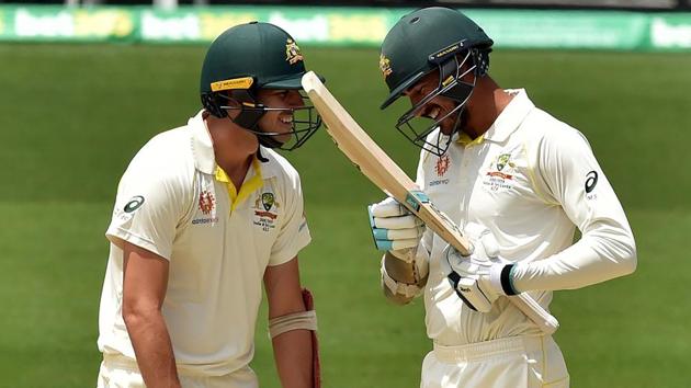 File image of Mitchell Starc (right) and Pat Cummins batting.(AFP)