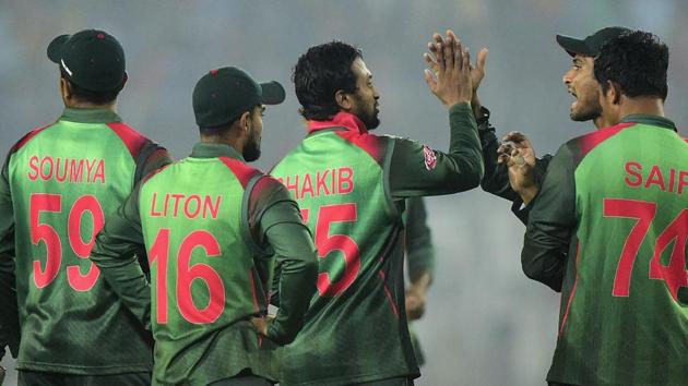 Bangladesh captain Shakib Al Hasan (C) celebrates with his teammates after the dismissal of West Indies cricketer Shimron Hetmyer during the second Twenty20 (T20) cricket match between Bangladesh and West Indies.(AFP)