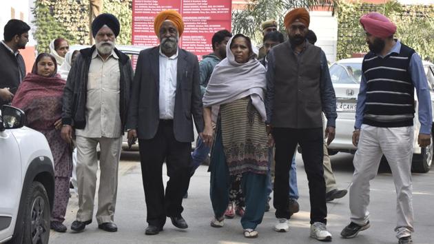 The Patiala House court today, heard a 1984 anti-Sikh riots case against Sajjan Kumar. Three persons -- Kumar, Brahmanand Gupta and Ved Prakash -- are facing trial on charges of murder and rioting in the case pertaining to the killing of Surjit Singh in Sultanpuri. The witness, Cham Kaur (C), had on November 16 identified Kumar before the court as one who had allegedly instigated the mob. (Sonu Mehta / HT Photo) The Patiala House court today, heard a 1984 anti-Sikh riots case against Sajjan Kumar. Three persons -- Kumar, Brahmanand Gupta and Ved Prakash -- are facing trial on charges of murder and rioting in the case pertaining to the killing of Surjit Singh in Sultanpuri. The witness, Cham Kaur (C), had on November 16 identified Kumar before the court as one who had allegedly instigated the mob. (Sonu Mehta / HT Photo)