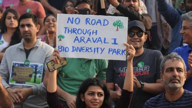 In October, hundreds of people came out to protest against a proposed six-lane expressway which would have cut into a third of the Aravalli Biodiversity Park’s 380 acres.(HT File)