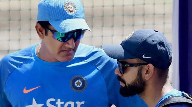 Anil Kumble interacts with skipper Virat Kohli during practice session before the third Test match against Australia.(PTI) Anil Kumble interacts with skipper Virat Kohli during practice session before the third Test match against Australia.(PTI)