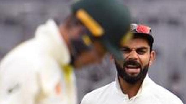 India's captain Virat Kohli (R) yells at Australia's captain Tim Paine (L) on the third day of the second Test match in Perth. (AFP) India's captain Virat Kohli (R) yells at Australia's captain Tim Paine (L) on the third day of the second Test match in Perth. (AFP)