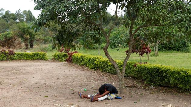 The mother of a baby suspected of dying from Ebola, cries outside a hospital in Beni, North Kivu Province of Democratic Republic of Congo. (Goran Tomasevic / REUTERS) 