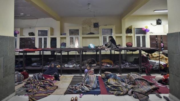 In all, the 248 shelters can house over 17,000 people. According to DUSIB officials, till Tuesday, occupancy was at around 8,700 people. The agency is not providing heaters as they are not safe and can cause fires. Guidelines of the National Urban Livelihoods Mission state that food and 50 sq ft space must be given to every person in the shelters. (Burhaan Kinu / HT Photo) In all, the 248 shelters can house over 17,000 people. According to DUSIB officials, till Tuesday, occupancy was at around 8,700 people. The agency is not providing heaters as they are not safe and can cause fires. Guidelines of the National Urban Livelihoods Mission state that food and 50 sq ft space must be given to every person in the shelters. (Burhaan Kinu / HT Photo)
