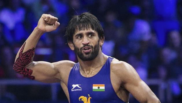 File image: Indian wrestler Bajrang Punia reacts after winning the World Championship 2018 semifinal match in Budapest.(PTI)