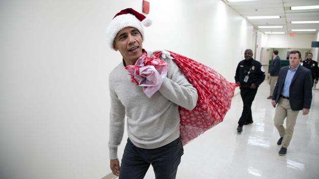 Former US President Barack Obama arrives to deliver gifts, greet patients and their parents at Children’s National Medical Center in Washington, DC. (Chuck Kennedy / Courtesy of the Office of The Obama Foundation / AFP) 