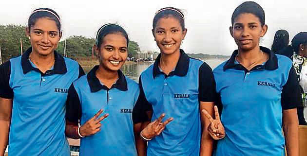 (from left) Sneha Biju, Meenakshy VS, Rose Mariya Joshi and Amrutha DA pose for a picture after winning gold medal in coxless fours 500 metres final in the 37th Senior National Rowing Championship at Army Rowing Node (ARN) in College of Military Engineering (CME) campus on Saturday.(HT)