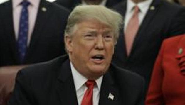 United States president Donald Trump signed a bill Friday to name a Virginia post office after Humayun Khan, the Muslim-American soldier killed in Iraq.(AP) United States president Donald Trump signed a bill Friday to name a Virginia post office after Humayun Khan, the Muslim-American soldier killed in Iraq.(AP)