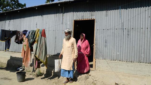 Yarjan Nesa and her husband Nur Mohammad leave their house. Yarjan submitted a certificate issued by the head of her village to establish her link with her mother, but it was rejected. “I do not have any other document as I have never been to school or never had a bank account anywhere,” she said. (Biju Boro / AFP) Yarjan Nesa and her husband Nur Mohammad leave their house. Yarjan submitted a certificate issued by the head of her village to establish her link with her mother, but it was rejected. “I do not have any other document as I have never been to school or never had a bank account anywhere,” she said. (Biju Boro / AFP)