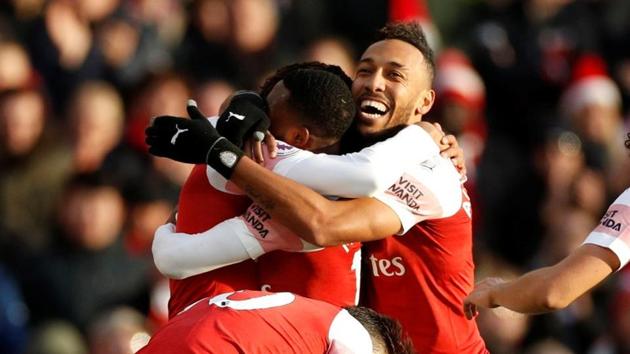 Arsenal's Alex Iwobi celebrates scoring their third goal with Pierre-Emerick Aubameyang and team mates. (Action Images via Reuters) Arsenal's Alex Iwobi celebrates scoring their third goal with Pierre-Emerick Aubameyang and team mates. (Action Images via Reuters)
