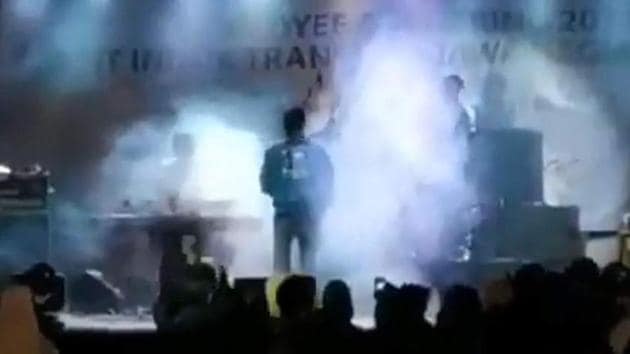 Partygoers screamed as tsunami waves smashed into a beachside concert in Indonesia, sending band members tumbling off a collapsing stage, dramatic video footage showed on Sunday.(Screengrab of video shared online) Partygoers screamed as tsunami waves smashed into a beachside concert in Indonesia, sending band members tumbling off a collapsing stage, dramatic video footage showed on Sunday.(Screengrab of video shared online)