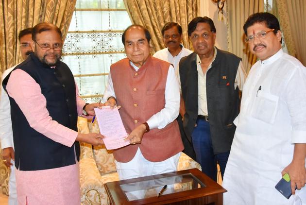 NCP spokesperson Ankush Kakade (left) and DY Patil holding a primary party membership form. (HT PHOTO) NCP spokesperson Ankush Kakade (left) and DY Patil holding a primary party membership form. (HT PHOTO)