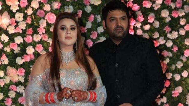 Kapil Sharma and Ginni Chatrath pose at their Mumbai wedding reception.