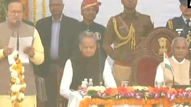 The swearing-in ceremony of 13 cabinet ministers and 10 state ministers of newly-formed Rajasthan government was held at Raj Bhavan, Jaipur on Monday.(ANI/Twitter)