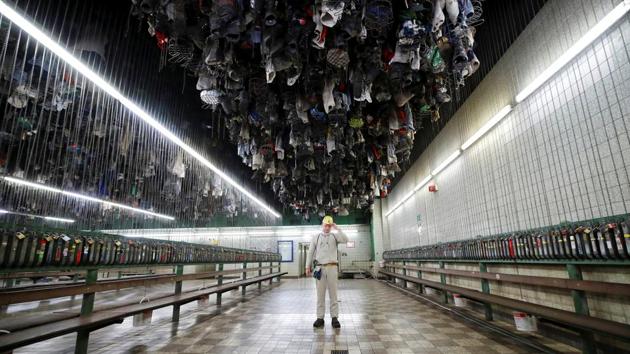 Marcel Pawlinka, a 24-year-old miner, stands in the coe, the change and wash house of the mine. Steinmeier urged the miners and their loved ones to look to the future, but also to take pride in a culture of hospitality and openness. (Wolfgang Rattay / REUTERS) Marcel Pawlinka, a 24-year-old miner, stands in the coe, the change and wash house of the mine. Steinmeier urged the miners and their loved ones to look to the future, but also to take pride in a culture of hospitality and openness. (Wolfgang Rattay / REUTERS)
