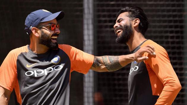 India's captain Virat Kohli laughs with teammate Ravindra Jadeja during a training session in Melbourne. (AFP) India's captain Virat Kohli laughs with teammate Ravindra Jadeja during a training session in Melbourne. (AFP)