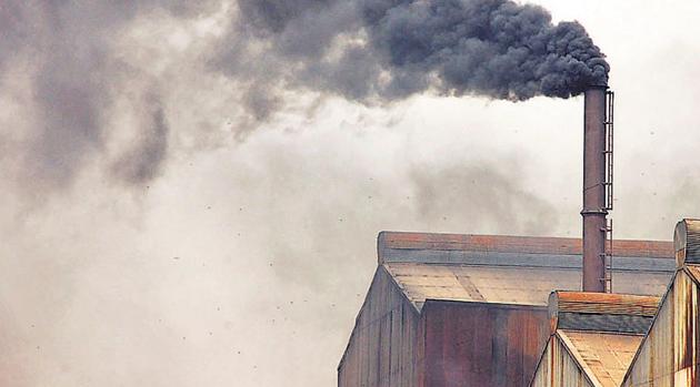 Black soot coming out of a chimney of a factory in Sahibabad Site IV Industrial Area in Ghaziabad. The city is most polluted in Delhi and NCR. (HT Photo) Black soot coming out of a chimney of a factory in Sahibabad Site IV Industrial Area in Ghaziabad. The city is most polluted in Delhi and NCR. (HT Photo)
