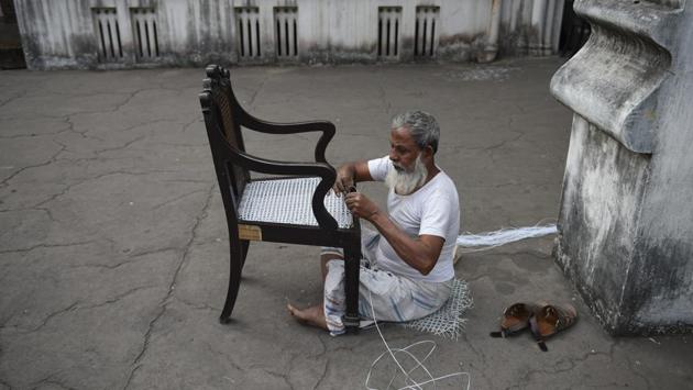 Rashid Mollah repairs a chair at St. Paul’s Cathedral. The cathedral is now gearing up for the upcoming Christmas celebrations. (Arijit Sen / HT Photo) Rashid Mollah repairs a chair at St. Paul’s Cathedral. The cathedral is now gearing up for the upcoming Christmas celebrations. (Arijit Sen / HT Photo)