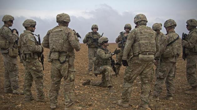 US soldiers during a combined joint patrol rehearsal in Manbij, Syria. The order has been signed for the withdrawal of American troops from Syria, where they have been deployed to assist in the war against the Islamic State jihadist group.(AP File Photo)