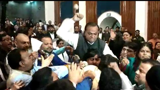 A video of the meeting shows BJP councillor from Bhalswa, Surender Singh Khrub, appearing to hit AAP’s councillor from Wazirpur, Vikas Goel. (HT photo) A video of the meeting shows BJP councillor from Bhalswa, Surender Singh Khrub, appearing to hit AAP’s councillor from Wazirpur, Vikas Goel. (HT photo)