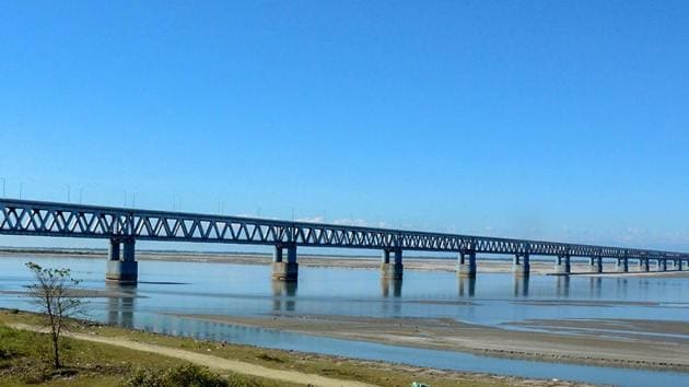 Prime Minister Narendra Modi today inaugurated the Bogibeel bridge, India’s longest rail and road bridge, connecting Assam’s Dibrugarh on the south bank to Dehamji in the north, bordering Arunachal Pradesh. The bridge over the Brahmaputra will boost defence logistics along the China border and reduce travel time for rail passengers and road users. (PTI File) Prime Minister Narendra Modi today inaugurated the Bogibeel bridge, India’s longest rail and road bridge, connecting Assam’s Dibrugarh on the south bank to Dehamji in the north, bordering Arunachal Pradesh. The bridge over the Brahmaputra will boost defence logistics along the China border and reduce travel time for rail passengers and road users. (PTI File)