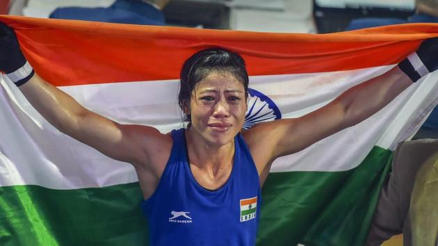 Indian boxer Mary Kom (in Blue) gets emotional as she celebrates after winning the final match.(AP)