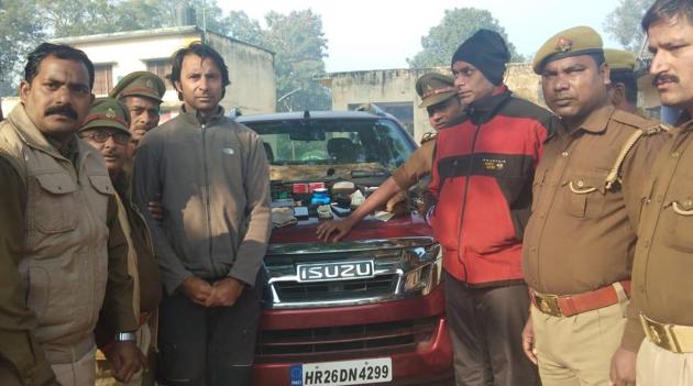 Golfer Jyoti Randhawa (2nd from left) arrested on poaching charges in Uttar Pradesh’s Bahraich.(HT Photo)