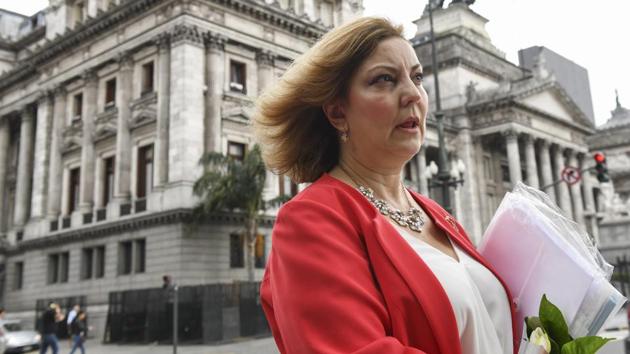 Congressional aide Claudia Guebel said i didn’t know how to react, i was paralyzed.(AP) Congressional aide Claudia Guebel said i didn’t know how to react, i was paralyzed.(AP)