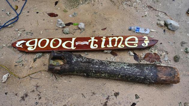 A wooden sign that read “Good Times” lies on the ground. At the Tanjung Lesung resort, cars and minibuses had been thrown against buildings, concrete walls cracked into small pieces and trees uprooted. More than 200 workers from the state electricity company were watching pop band “Seventeen” perform when the tsunami struck leaving only the four-member band’s lead vocalist alive. (Adek Berry / AFP) A wooden sign that read “Good Times” lies on the ground. At the Tanjung Lesung resort, cars and minibuses had been thrown against buildings, concrete walls cracked into small pieces and trees uprooted. More than 200 workers from the state electricity company were watching pop band “Seventeen” perform when the tsunami struck leaving only the four-member band’s lead vocalist alive. (Adek Berry / AFP)