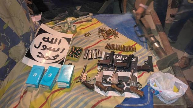 Several weapons and a cache of ammunition which were recovered by NIA during its raids at 17 locations across Meerut, Lucknow, Hapur, Amroha and Seelampur in connection with its probe into a new Islamic State-inspired module in New Delhi on December 26.(PTI Photo)