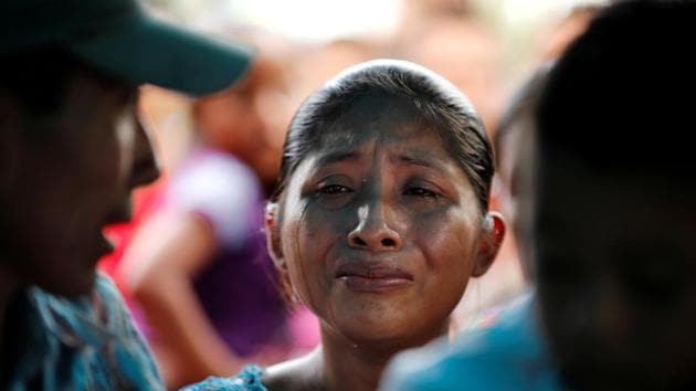 Claudia Maquin, mother of Jakelin Caal, a 7-year-old girl who handed herself in to US border agents earlier this month and died after developing a high fever while in the custody of US Customs and Border Protection, reacts during her daughter's funeral at her home village of San Antonio Secortez, in Guatemala. (REUTERS) Claudia Maquin, mother of Jakelin Caal, a 7-year-old girl who handed herself in to US border agents earlier this month and died after developing a high fever while in the custody of US Customs and Border Protection, reacts during her daughter's funeral at her home village of San Antonio Secortez, in Guatemala. (REUTERS)