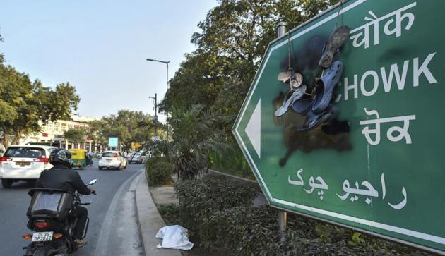 A Rajiv Chowk sign board defaced with black ink amid anti-Congress protest, in New Delhi, Wednesday, December 26, 2018.(AP)