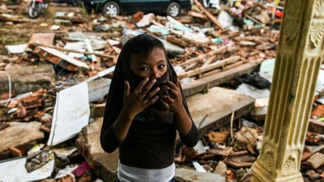 Many have been left homeless by the killer wave, and fear going back to their communities. (Mohd Rasfan / AFP) Many have been left homeless by the killer wave, and fear going back to their communities. (Mohd Rasfan / AFP)