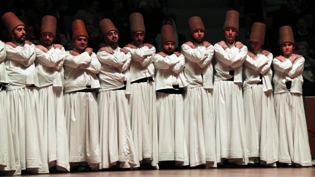 Whirling dervishes prepare for the Sheb-i Arus ceremony. Rumi, also known as Mevlana, was born in Persia but settled in Konya, where he died and was buried 745 years ago. His death brought the establishment of the Mevlevi order of Sufism, the mystical form of Islam. (Lefteris Pitarakis / AP Photo) Whirling dervishes prepare for the Sheb-i Arus ceremony. Rumi, also known as Mevlana, was born in Persia but settled in Konya, where he died and was buried 745 years ago. His death brought the establishment of the Mevlevi order of Sufism, the mystical form of Islam. (Lefteris Pitarakis / AP Photo)