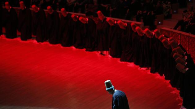 Whirling dervishes bow at the start of a Sheb-i Arus ceremony. The dervishes, who are followers of Rumi, mark the anniversary of his December 17 passing — known as “Sheb-i Arus” or night of the union — as a celebration of his reunion with the Divine. Rumi himself believed death was a moment for rejoicing in the union with God. (Lefteris Pitarakis / AP Photo) Whirling dervishes bow at the start of a Sheb-i Arus ceremony. The dervishes, who are followers of Rumi, mark the anniversary of his December 17 passing — known as “Sheb-i Arus” or night of the union — as a celebration of his reunion with the Divine. Rumi himself believed death was a moment for rejoicing in the union with God. (Lefteris Pitarakis / AP Photo)