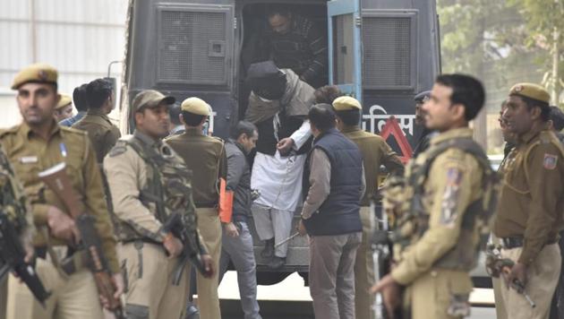 A Delhi court has sent 10 people, arrested on Wednesday for alleged links with an ISIS module, to the National Investigation Agency’s custody for 12 days. They were produced in the court of Additional Sessions Judge Ajay Pandey amid tight security with faces covered. The judge had ordered in-camera proceedings in the case. (Sanjeev Verma / HT Photo) A Delhi court has sent 10 people, arrested on Wednesday for alleged links with an ISIS module, to the National Investigation Agency’s custody for 12 days. They were produced in the court of Additional Sessions Judge Ajay Pandey amid tight security with faces covered. The judge had ordered in-camera proceedings in the case. (Sanjeev Verma / HT Photo)